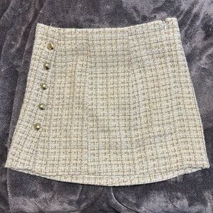 White and gold mini skirt